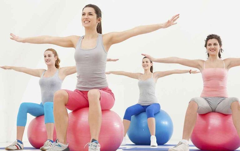 Four Person Yoga Poses: Strengthening Bonds and Bodies Together